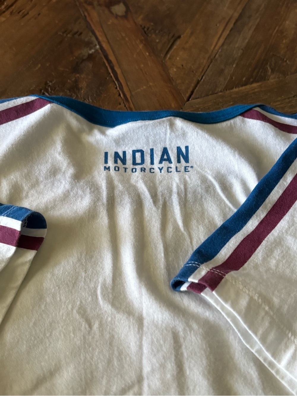 Indian Motorcycle Women’s White Logo Tee with Blue & Maroon Striped Accents - Picture 5 of 8